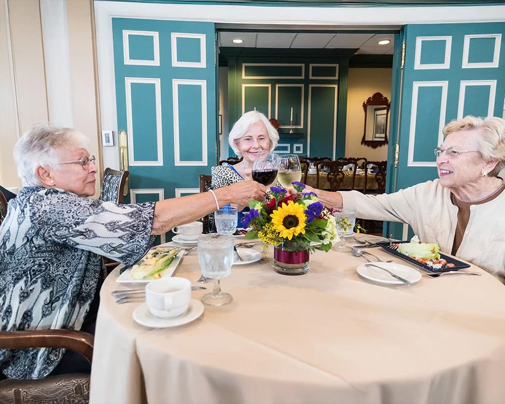 Residents toasting drinks